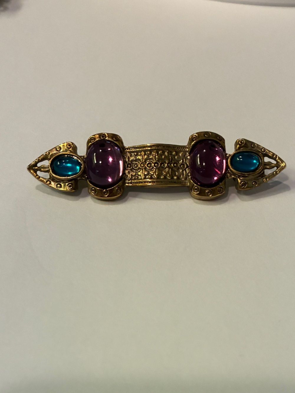 Gold-Tone Brooch with Purple and Teal Cabochons